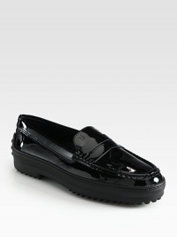 A durable rubber trek sole elevates this moccasin-inspired staple in luxurious Italian patent leather. Patent leather upperLeather liningRubber trek solePadded insoleMade in ItalyOUR FIT MODEL RECOMMENDS ordering true size. 