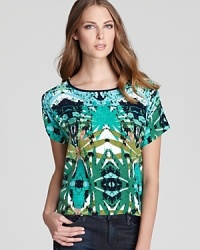 Work a taste of paradise into the everyday with this Sam & Lavi top in a vivid kaleidoscope print.