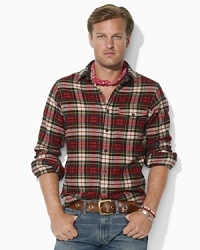 A handsome throat latch and patch pocket at the chest lend a hint of rugged flair to a classic button-down in plaid cotton twill.