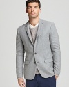 Spruce up your cocktail party attire with this effortless blazer, handsome with dark wash jeans or a more straightforward pair of trousers alike.