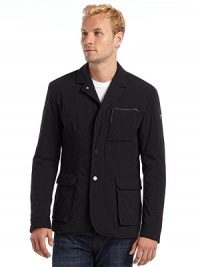 THE LOOKSingle-breasted jacket with notched lapelsButton flap over two-way front zip closureZippered chest pockesLower snap flap pocketsLong sleeves with adjustable button cuffsUnderarm ventsBack walking ventThermal quilted liningTwo inner security pocketsTHE FITAbout 30 from shoulder to hemTHE MATERIALNylonFill: polyesterCARE & ORIGINMachine washImported