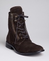 Diesel's Miliboots show off a side zip detail for an edgy finish. A laceup vamp completes the look.