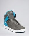 Raise the stakes with these street-ready kicks from Supra, a design with swagger and style.