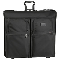 Slim and sleek, this garment cover is an effortless way to carry and protect a single suit or garment. It features an outside U-zip pocket for a travel kit or shoes and interior accessories pockets. Made from Tumi's signature ballistic nylon, it comes with its own hanger with a comfortable leather handle grip.Dimensions: 21 x 23.5 - H xW