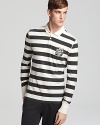 Burberry Brit's crest adorns this preppy polo in a bold rugby stripe.