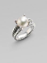 From the Cable Pearl Wrap Collection. A cultured pearl sits nestled among four stunning diamonds atop pillars of sterling silver, on a signature cabled band. 10½mm white cultured freshwater pearl Diamonds, 0.06 tcw Sterling silver Imported