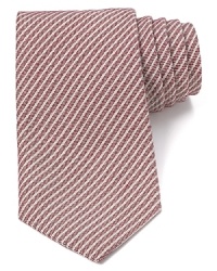 Demonstrate your sartorial wisdom with a classic tie featuring simple stripes from Armani Collezioni.