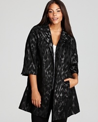 Classic jacquard goes contemporary chic as blurred brushstrokes shake up a sharply-tailored Eileen Fisher Plus coat.