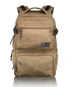 Whether you're hiking in the back country or trekking across the urban jungle, this backpack carries all your essentials with ease, constructed in canvas for rugged appeal and outfitted with organization pockets to keep you in command.