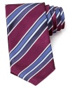 Not your average stripe design, this lavish silk tie is intricately detailed with deft variations on a classic width.