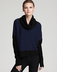 Flocked with stripes, this soft Aqua sweater flaunts a cozy cowl neckline to keep you warm as the temps drop.