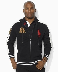 Accented with bold athletic stripes, a fleece full-zip hoodie celebrating the St. Moritz Polo World Cup on Snow features a snow polo crest and Ralph Lauren's embroidered Big Pony for a signature finish.