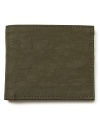 Fully loaded with 6 card slots, 1 bill slot and 2 other pockets, this durable nylon wallet from Jack Spade is a great everyday option to hold your cards, cash and ID.