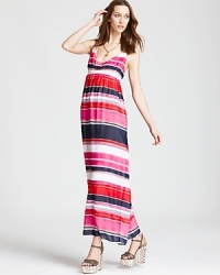 Strategic smocking at the waist lends a flattering shape to this airy VINCE CAMUTO maxi dress, wrapped in cheerful stripes for sunny days.