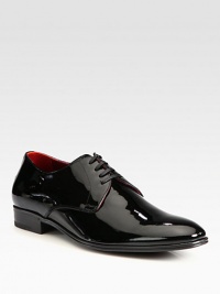 Handsomely crafted in sleek patent leather, this polished design is a formal wear essential.Patent leather upperLeather liningPadded insoleLeather sole Made in Italy