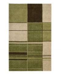 Fresh and fashion-forward, this handcrafted rug features a stylish, striped pattern of greens, browns and beige. Hand-carved of premium quality wool, this attractive piece adds bold new depth and dimension to any decor.