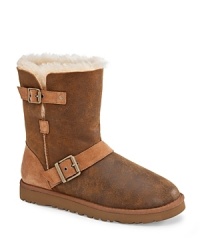 Tough but softies at heart, these UGG® Australia booties bring you moto looks in plush shearling.