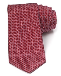 This plush silk tie balances a whimsical pattern of dots and circles with a traditional 3.5 width for a refined style that's perfect for the office or any of your dressed-up affairs.