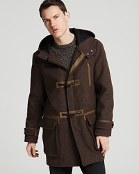 A warm, handsome coat protects you from the elements in bona fide style with this inspired look from MARC BY MARC JACOBS.