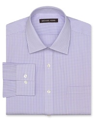 Michael Kors adds distinction and polish to this handsome gingham button-down for a refined yet refreshing take on the modern dress shirt. Crafted in crisp, soft cotton for comfort.