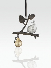 A silvery partridge perches on a delicate branch and gazes at a golden pear in a charming illustration of this beloved holiday setting.HandmadeSilverplated, goldplated and oxidizedAbout 5.5H X 4.25W X 1.75DImported