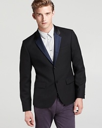 Contrast accents at the lapel boost this handsome blazer for a bit of designer flair. Crafted in soft wool from the always inventive MARC BY MARC JACOBS.