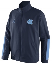 Get fired up! Keep the support of your favorite NCAA basketball team alive with this North Carolina Tar Heels jacket from Nike.