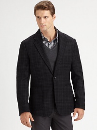 Single-breasted blazer displays a rich, textured appearance, tailored in superior virgin wool with a simple check pattern finish.Button-frontNotch lapelChest, waist patch pocketsSide ventsFully linedWoolDry cleanImported