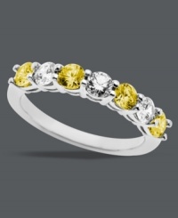 Citrus bliss. A splash of round-cut white (9/10 ct. t.w.) mixed with yellow Swarovski zirconias (1-1/4 ct. t.w.) make Arabella's stunning 7-stone ring a total stand out. Crafted in sterling silver. Size 7.