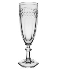 Regal shaping blends with romantic accents in this storybook stemware pattern from Villeroy & Boch. Ornate cut crystal stems support fluted bowls crowned by a fern leaf band.