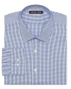 An upbeat yet totally traditional check shirt performs admirably in your workweek rotation and makes a nice variation from your solid button-downs.