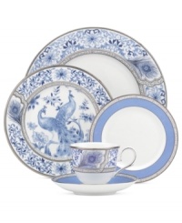 Elaborate scrolling vines and gorgeous feathers in regal blue adorn the Sapphire Plume serving bowl from Marchesa by Lenox. Lavish platinum bands complete a pattern that's destined for memorable meals.