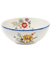 Freshen up. Colorful wildflowers scatter inside and out on the Scallop Floral serving bowl, a charming addition to country settings from Marcela for Prima Design. With dainty blue trim.