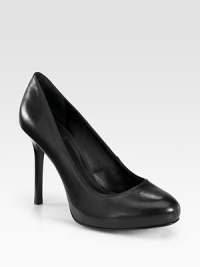 A wardrobe essential of sumptuous leather with a powerful stacked heel. Stacked heel, 4 (100mm)Leather upperLeather lining and solePadded insoleImported