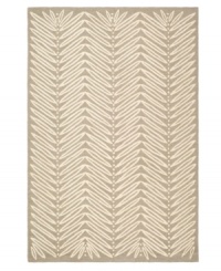 A herringbone pattern of leaves creates a fresh look for the modern home in this unique area rug from Martha Stewart rugs. Hand tufted in India of long wool fibers, this luxurious home accent presents unparalleled comfort and style underfoot.