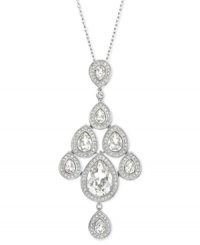 With an elegant, fluid silhouette, Swarovski's enchanting pendant features pear-shaped clear crystals which can move freely, much like a chandelier. A touch of clear crystal pavé adds extra sparkle. The pendant comes on a rhodium-plated chain and is perfect for an evening out! Approximate length: 15-7/10 inches + 1-2/5-inch extender. Approximate drop: 2-4/5 inches.