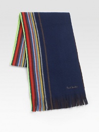 Reversible and multi-striped winter essential impeccably knitted in fine wool.Fringed ends10W x 71LWoolDry cleanImported