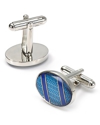 Grounded with an unexpected graphic herringbone pattern and featuring two diagonal stripes across the face, these cufflinks punch up your dress shirting attire with a unique mix of pattern, color and flash.