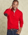 This Tommy Hilfiger fleece has a warm cozy feel and elbow patches for a stylish personality.