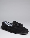 Stripes and tassels bring preppy snap to these casual slip-on loafers from Charles Philip.