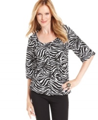 MICHAEL Michael Kors' petite top features a stylish zebra print and billowy blouson-style fit. Perfect for pairing with skirts, pants, jeans and more!