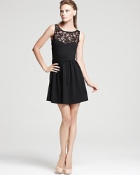 A pretty Aqua party dress designed with an elegant lace yoke is the perfect choice for the season's chicest happenings.