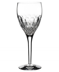 Crystal couture. Monique Lhuillier's Ellypse wine glass balances a minimalist stem with a pattern of intersecting cuts and rounded scoops in sumptuous Waterford crystal.