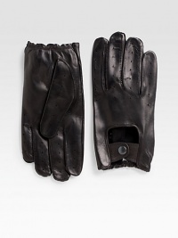 EXCLUSIVELY OURS. Created with heritage inspirations, this signature driving glove is crafted from the finest Italian leather, with perforations and a snap-button detail for a dose of luxury and long-lasting comfort.About 8 longLeatherDry cleanMade in Italy