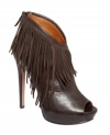 Cowboy up. Decked out in fringe with an exposed zipper, the Charmaine booties from Boutique 9 lend Western-chic appeal.