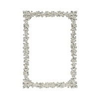 House your precious memories in a stunning frame of Swarovski® crystals finished with silver-tone metal for a sparkling display worthy of your photos.