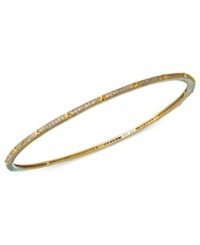 Stack on endless dazzle! This glamorous bangle bracelet from CRISLU is the perfect layering piece with cubic zirconia sparkle (1-1/4 ct. t.w.). Set in 18k gold over sterling silver. Approximate diameter: 2-1/2 inches.