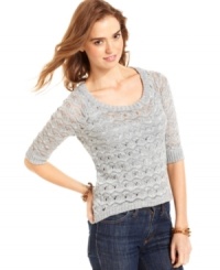 Layer-up this season in an open-knit sweater that comes loaded with metallic threading for a shot of pizzazz!