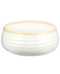 Distinctly ribbed Sophie Conran dinnerware sets your table with the charm of traditional hand-thrown pottery, but the durability of contemporary Portmeirion porcelain. Mix this banded Carnivale salad bowl with solid biscuit pieces.