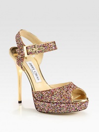 Look party-perfect wearing this multicolored glitter silhouette with a sky-high heel and platform. Lacquered heel, 5 (125mm)Glitter-coated fabric platform, 1 (25mm)Compares to a 4 heel (100mm)Glitter-coated fabric upperAdjustable ankle strapLeather lining and solePadded insoleMade in Italy